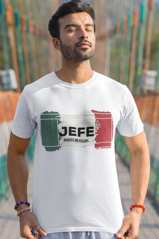 White crew-neck t-shirt with a distressed Mexican flag graphic across the chest featuring the word "JEFE" in bold black font in the center.