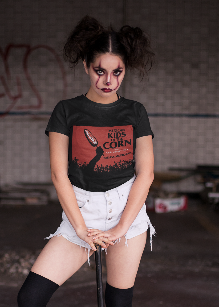 Black crew-neck t-shirt featuring a red retro movie poster graphic with a hand holding a spiced corn on a stick above a cornfield silhouette.