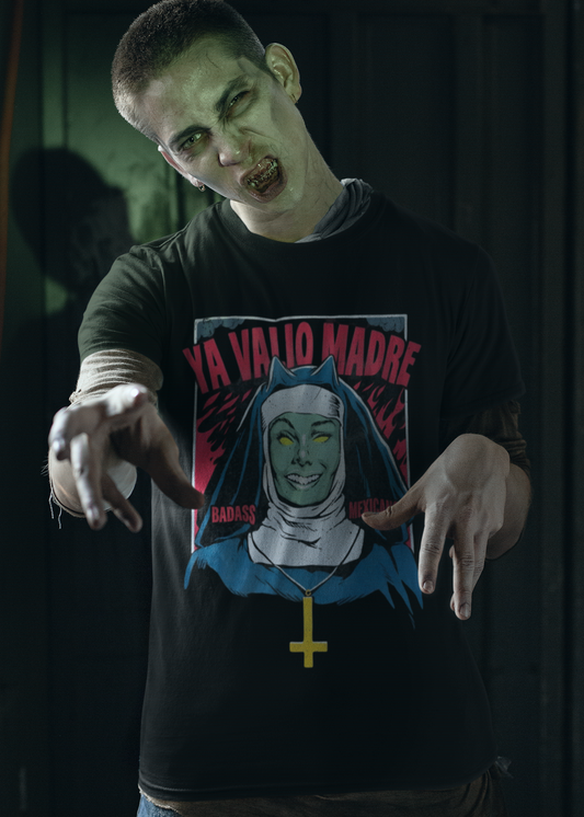 Black t-shirt with a retro comic graphic of a possessed nun and red text reading "YA VALIÓ MADRE".