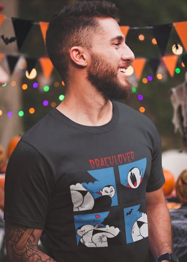 Black t-shirt featuring a red "DRACULOVER" title above a 4-panel comic graphic of a cartoon vampire biting a lower back.