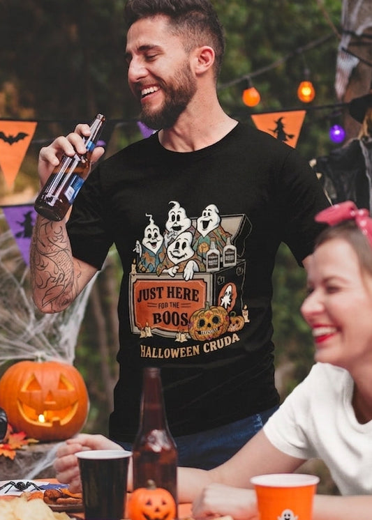 Black t-shirt with a vintage illustration of ghosts coming out of a cooler with tequila bottles and text reading "JUST HERE FOR THE BOOS HALLOWEEN CRUDA".