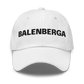White dad hat style cap, embroidered with the legend BALENBERGA