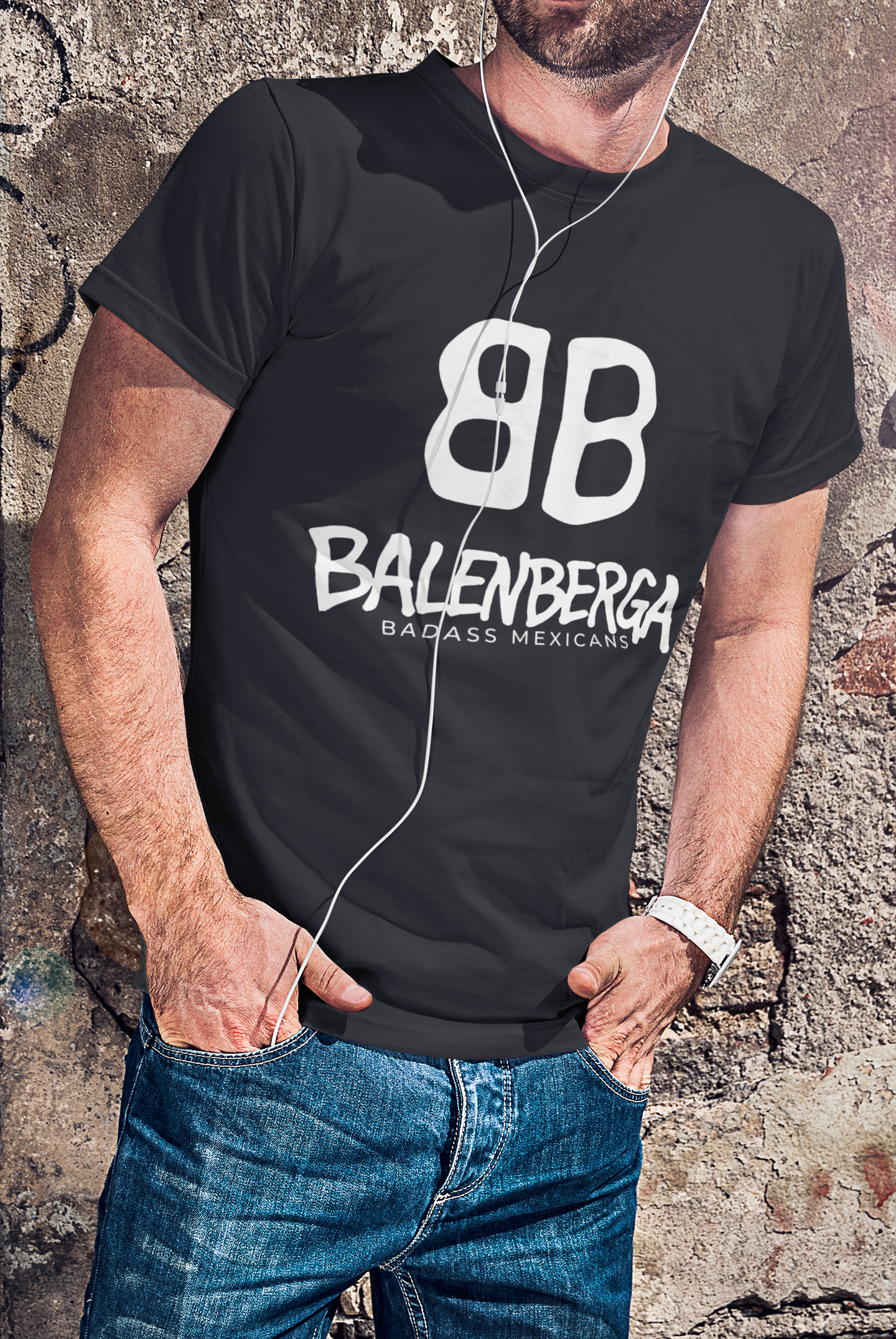 cropped-face-mockup-of-a-man-wearing-a-crew-neck showing a close-up, front view of a premium black graphic t-shirt. On the center of the chest, a large white logo features two "B" characters mirrored and interlocked back-to-back. Directly below the logo, the word "BALENBERGA" is printed in an edgy, stylized white paint-stroke font, with "BADASS MEXICANS" cleanly written underneath in a small, minimalist font.