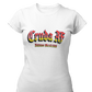 A white fitted women's crew-neck t-shirt featuring the text "Cruda AF" printed across the chest in a bold, stylized Gothic font. The letters feature a horizontal color gradient transition from red at the top, fading into yellow and white at the bottom, outlined in black with a heavy black drop shadow. Directly below, the words "BADASS MEXICANS" are printed in a smaller, matching Gothic font with the same red, yellow, and white gradient and drop shadow effect.