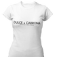 A fitted white women's t-shirt with the words "DULCE & CABRONA" printed in a clean, white luxury-style font. Below the main text, "BADASS MEXICANS" is printed in a smaller, secondary font.