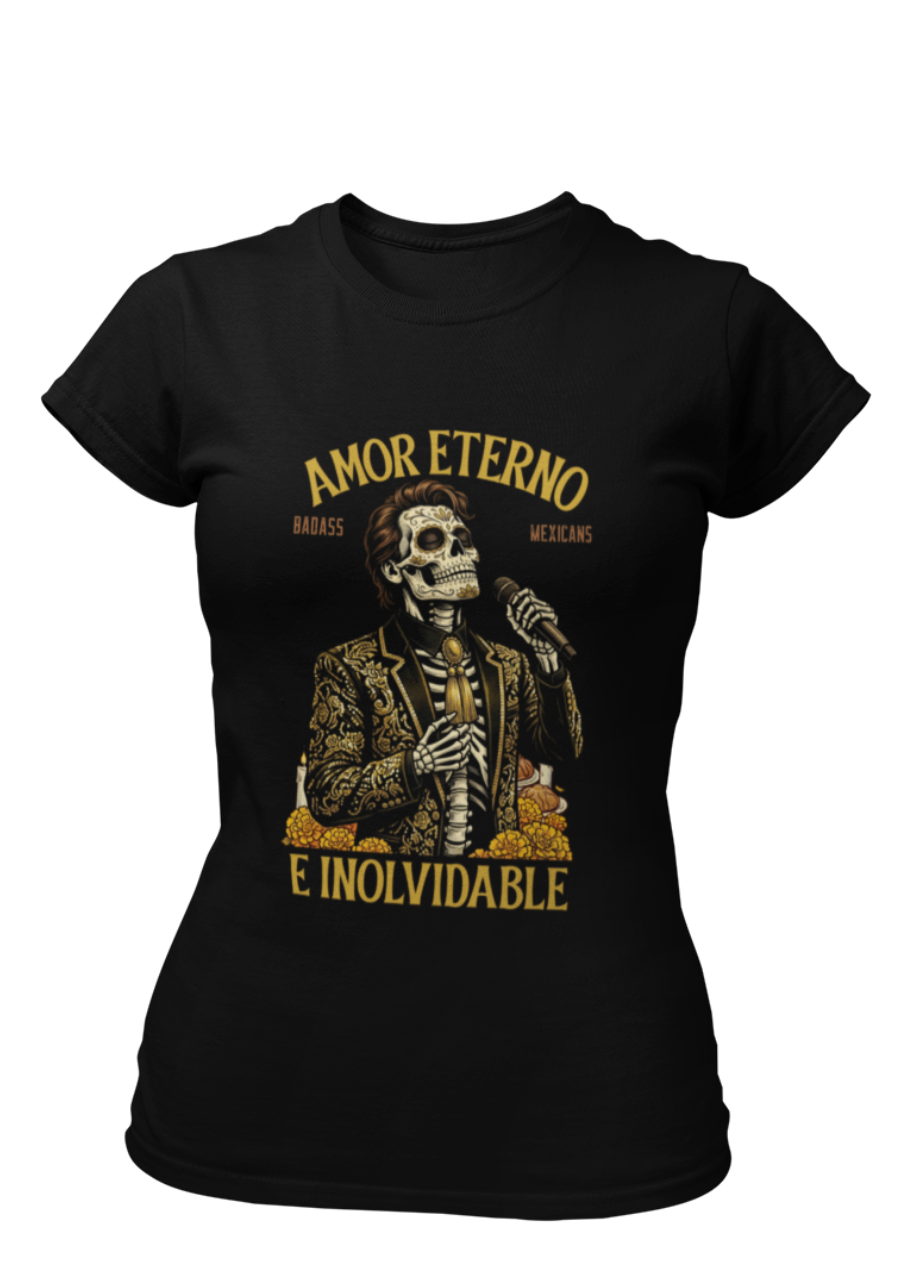 Black t-shirt featuring a detailed Catrín graphic of Juan Gabriel holding a microphone surrounded by golden text reading "AMOR ETERNO E INOLVIDABLE".