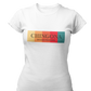 A white fitted women's crew-neck t-shirt featuring a horizontal graphic design across the chest. The design features five vertical, vintage-toned color blocks lined up side-by-side in pastel yellow, soft orange, terracota red, deep pink, and muted teal. Overlaid across these colorful blocks, the word "CHINGONA" is printed in a large, elegant dark gray serif font, with the words "BADASS MEXICANS" written directly underneath in a smaller, clean sans-serif typeface.
