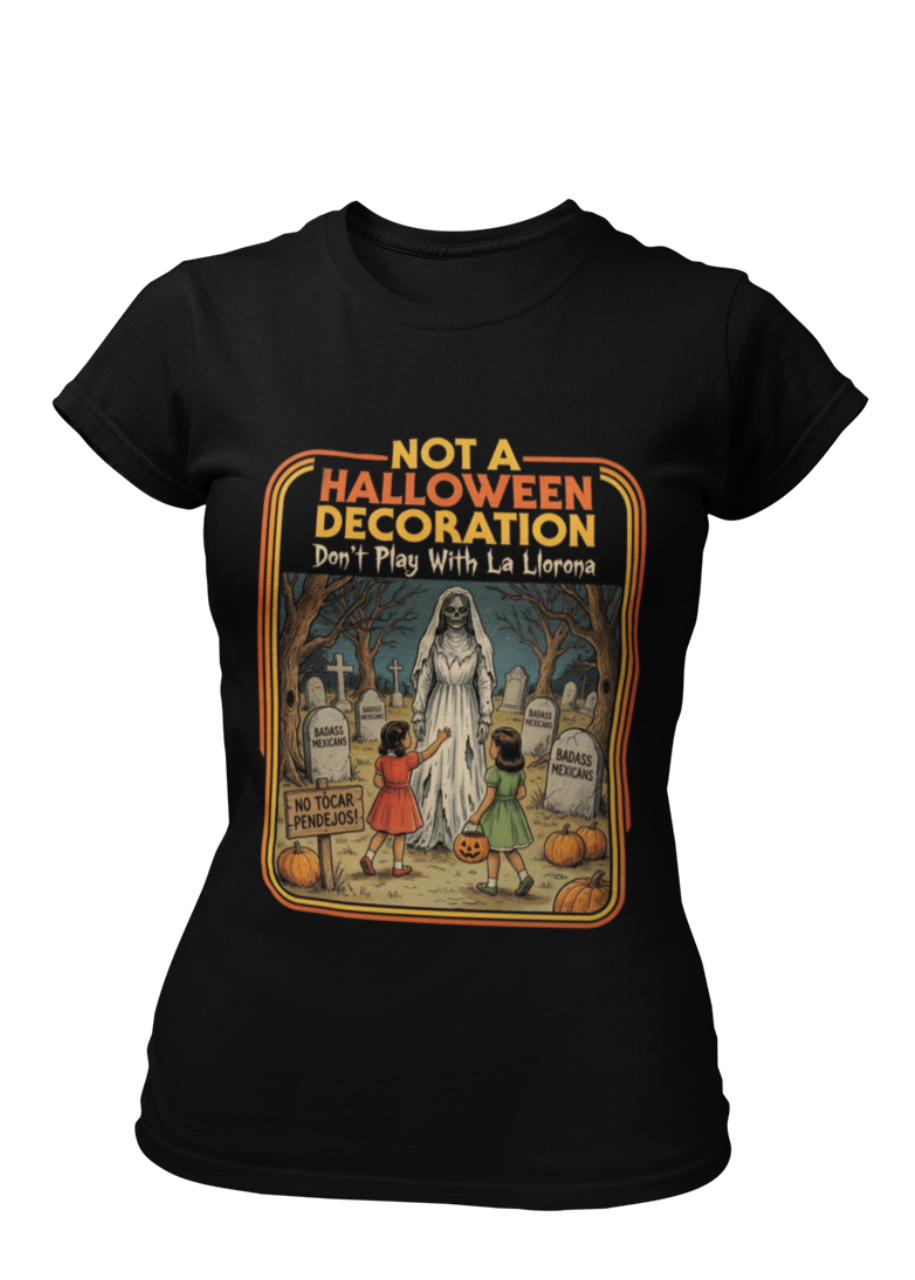 Black t-shirt featuring a retro horror poster illustration of La Llorona in a graveyard above the text "NOT A HALLOWEEN DECORATION Don't Play With La Llorona".