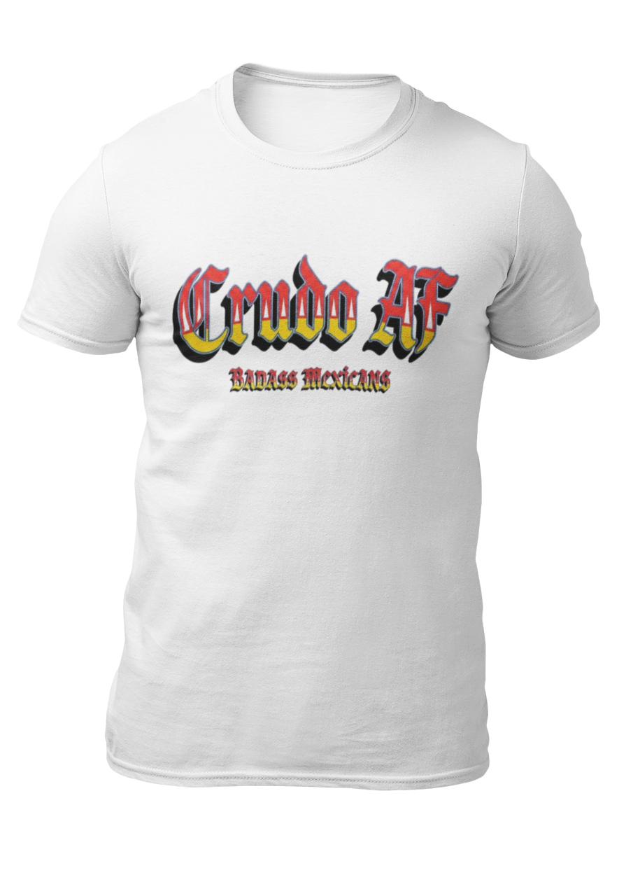 A white crew-neck t-shirt featuring the text "Crudo AF" printed across the chest in a bold, stylized Gothic font. The letters have a horizontal color gradient transition from red at the top, fading into yellow and white at the bottom, outlined in black with a heavy black drop shadow. Directly below, the words "BADASS MEXICANS" are printed in a smaller, matching Gothic font with the same red, yellow, and white gradient and drop shadow effect.