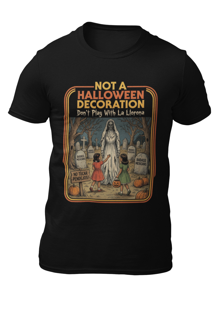 Black t-shirt featuring a retro horror poster illustration of La Llorona in a graveyard above the text "NOT A HALLOWEEN DECORATION Don't Play With La Llorona".