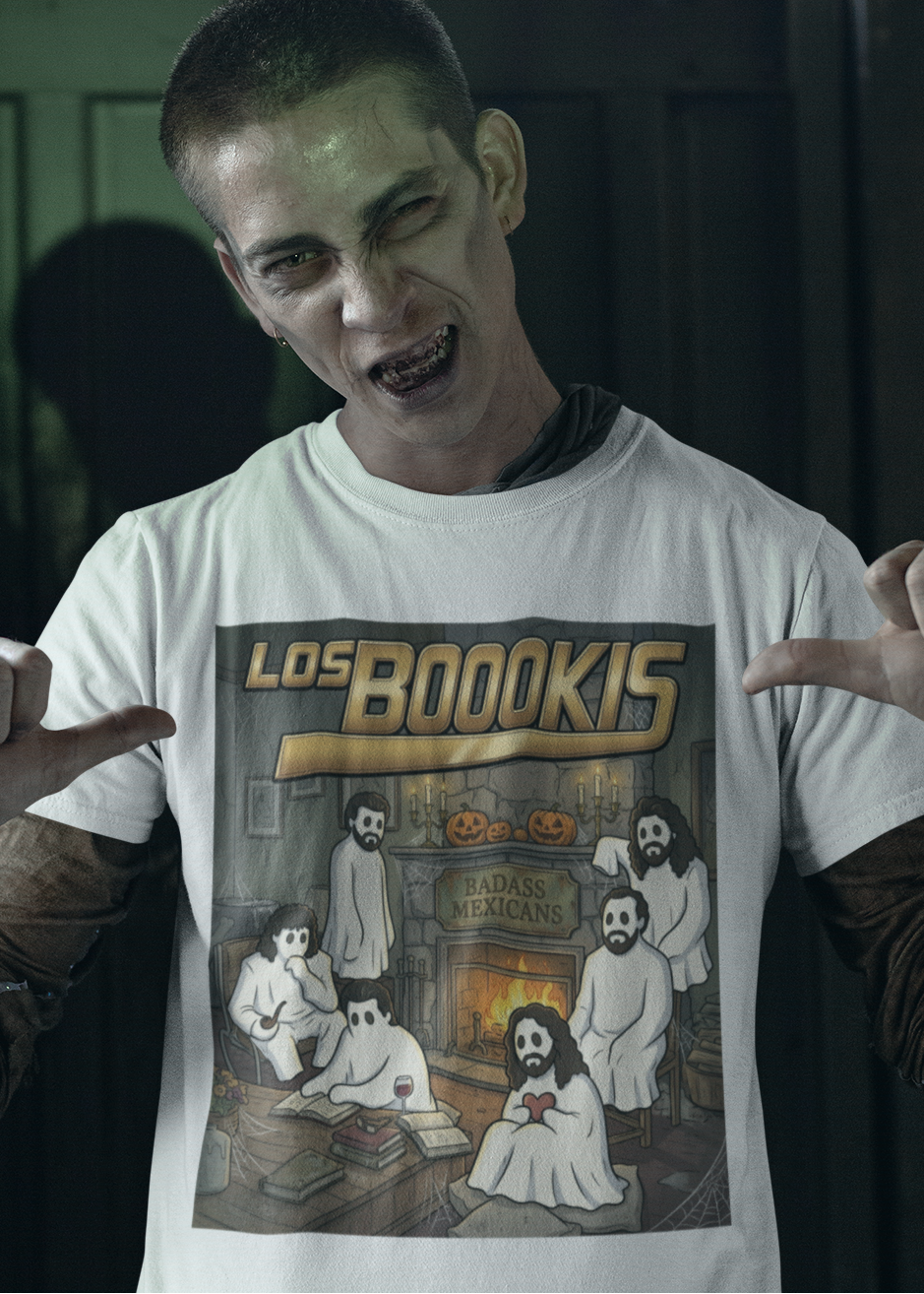 White t-shirt featuring a spooky band parody with ghosts around a fireplace with text reading "LOS BOOOKIS".