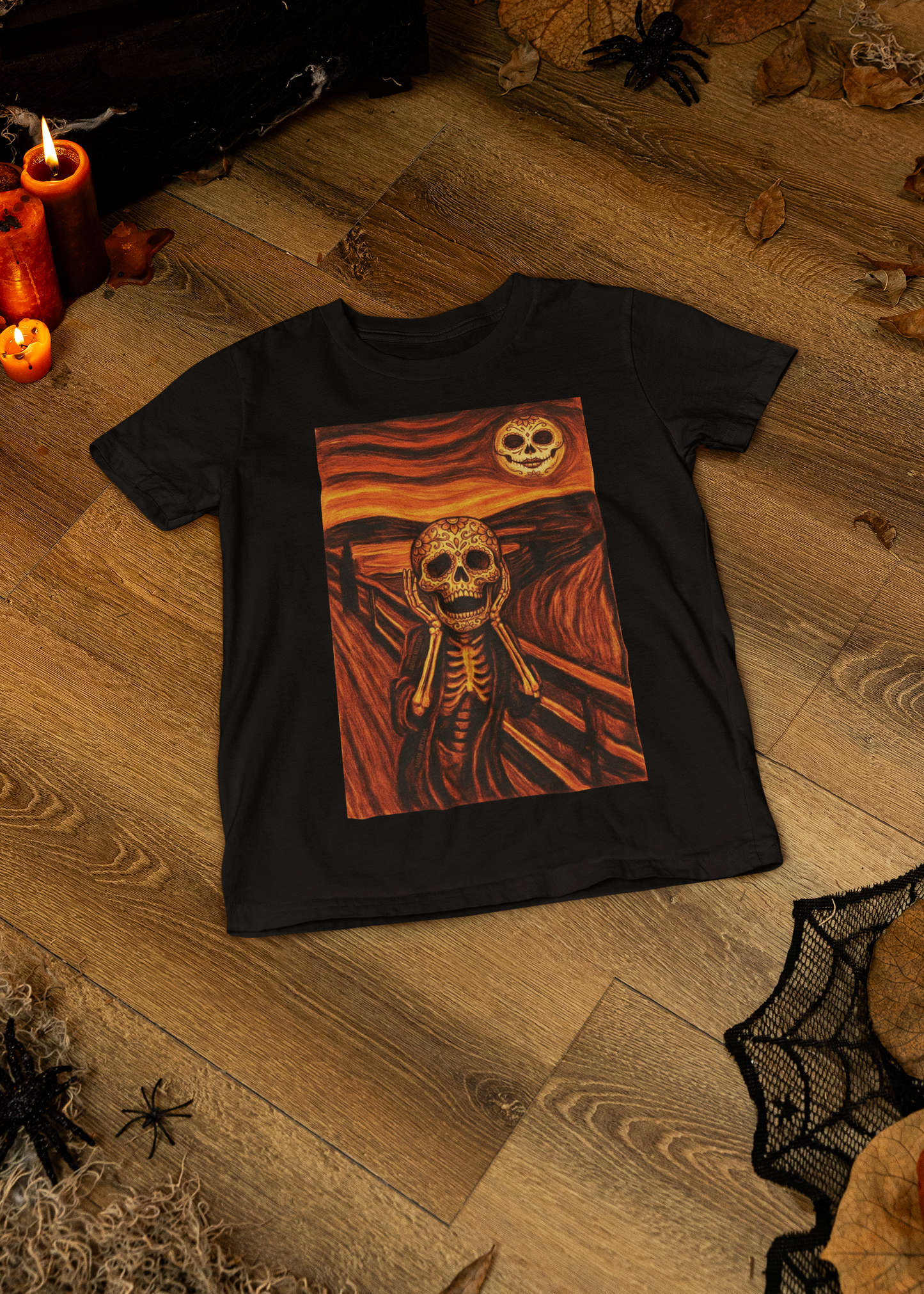 Black t-shirt with an artistic painting parodying Munch's The Scream featuring a sugar skull skeleton figure and moon.