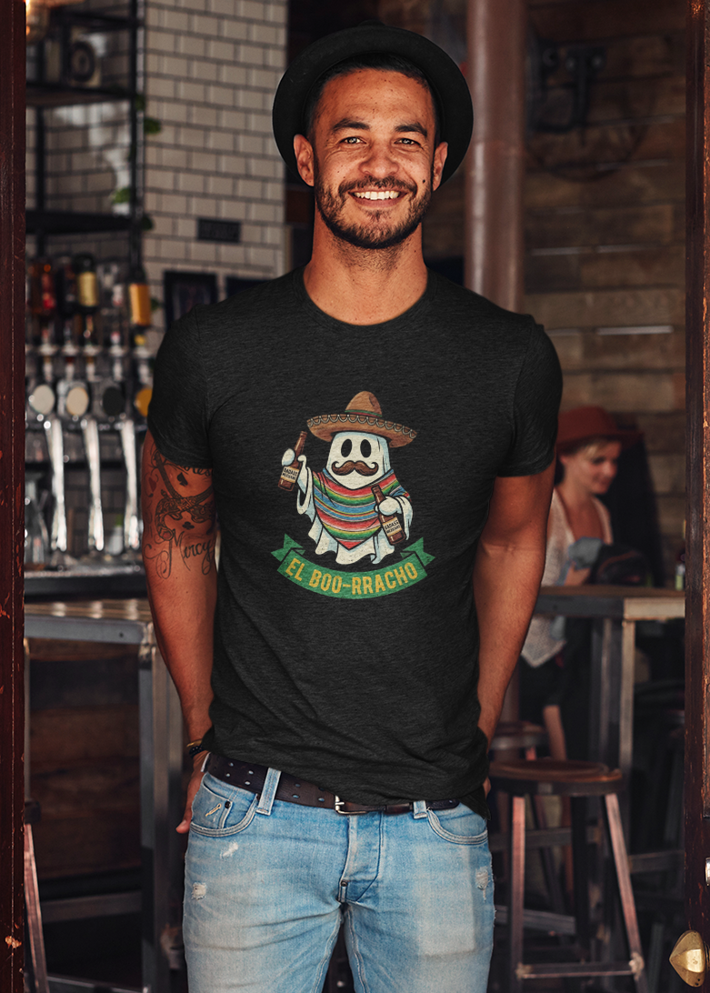 Black t-shirt featuring an illustration of a mustache ghost wearing a Mexican sombrero and sarape holding bottles above text reading "EL BOO-RRACHO".
