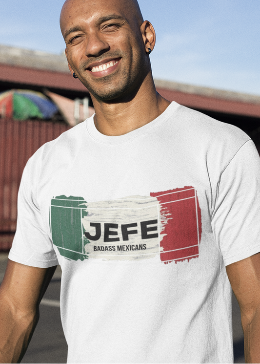 White crew-neck t-shirt with a distressed Mexican flag graphic across the chest featuring the word "JEFE" in bold black font in the center.