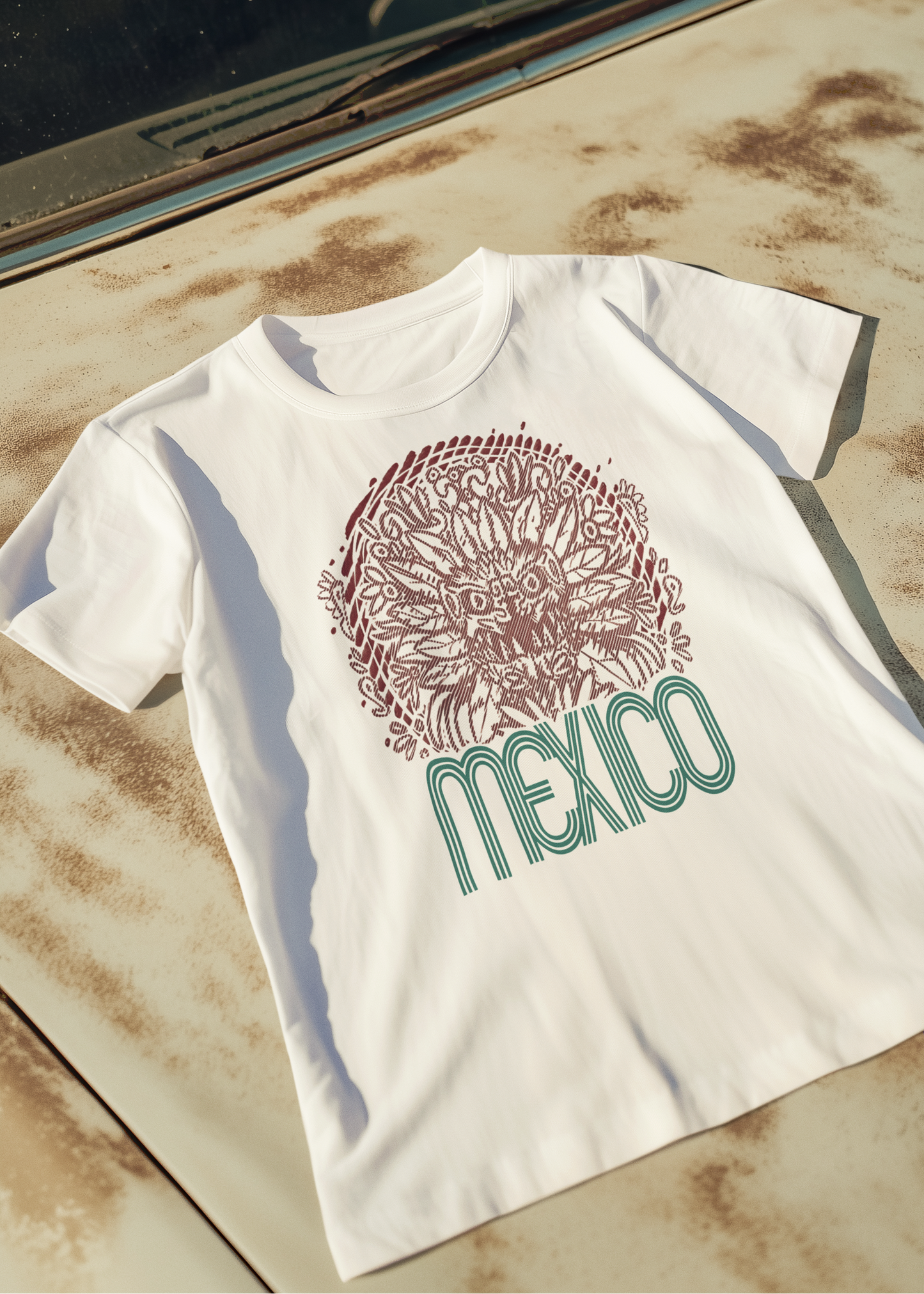 white graphic t-shirt with front print quetzalcoatl inspired mexican design and retro mexico typography