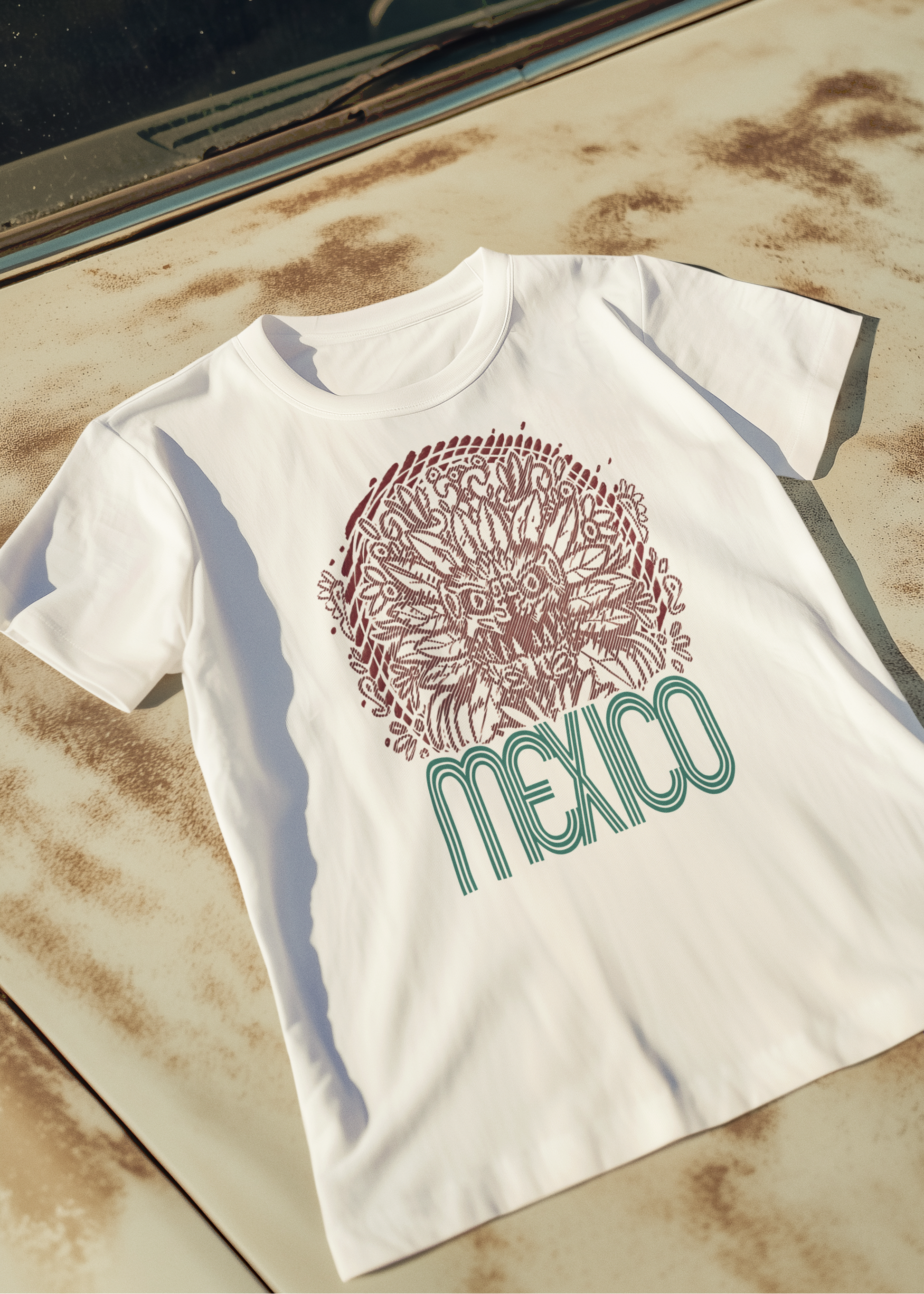 white graphic t-shirt with front print quetzalcoatl inspired mexican design and retro mexico typography