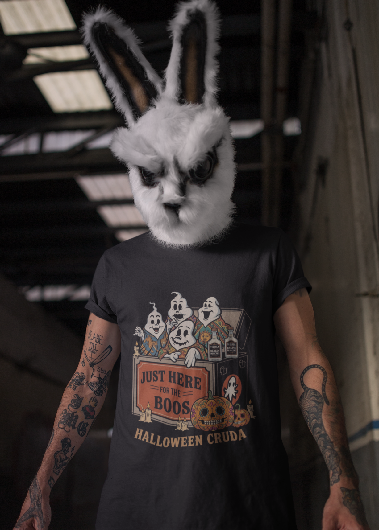 Black t-shirt with a vintage illustration of ghosts coming out of a cooler with tequila bottles and text reading "JUST HERE FOR THE BOOS HALLOWEEN CRUDA".