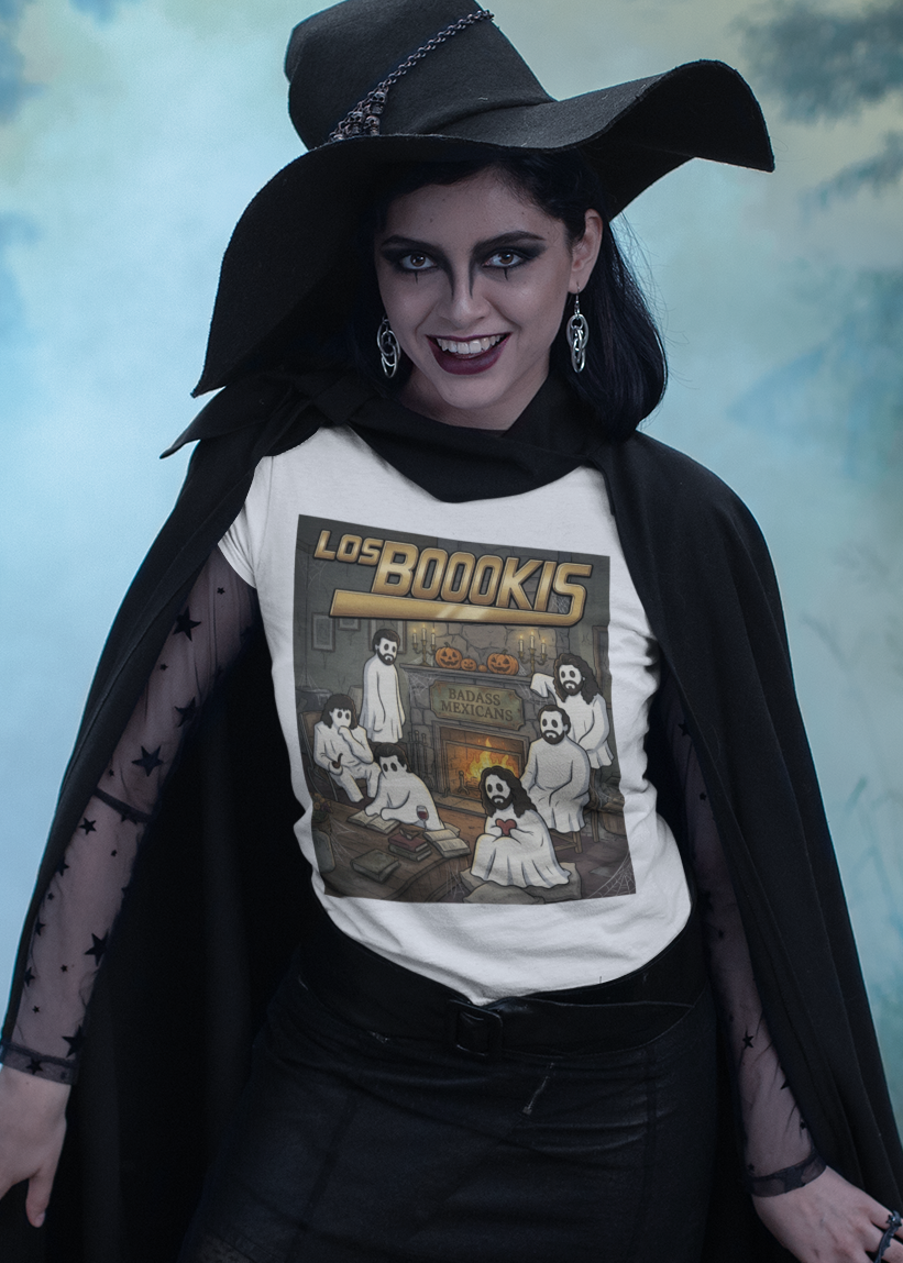White t-shirt featuring a spooky band parody with ghosts around a fireplace with text reading "LOS BOOOKIS".