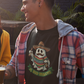 Black t-shirt featuring an illustration of a mustache ghost wearing a Mexican sombrero and sarape holding bottles above text reading "EL BOO-RRACHO".