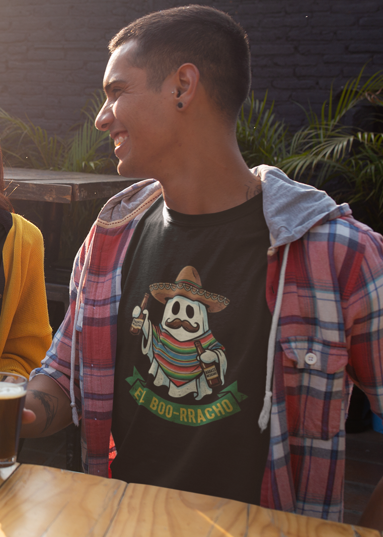 Black t-shirt featuring an illustration of a mustache ghost wearing a Mexican sombrero and sarape holding bottles above text reading "EL BOO-RRACHO".
