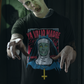 Black t-shirt with a retro comic graphic of a possessed nun and red text reading "YA VALIÓ MADRE".