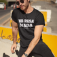 Man wearing a black unisex t-shirt with the phrase “No Pasa Nada” printed in bold white letters