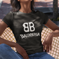 front view of a premium black graphic t-shirt. On the center of the chest, a large white logo features two "B" characters mirrored and interlocked back-to-back. Directly below the logo, the word "BALENBERGA" is printed in an edgy, stylized white paint-stroke font, with "BADASS MEXICANS" cleanly written underneath in a small, minimalist font.