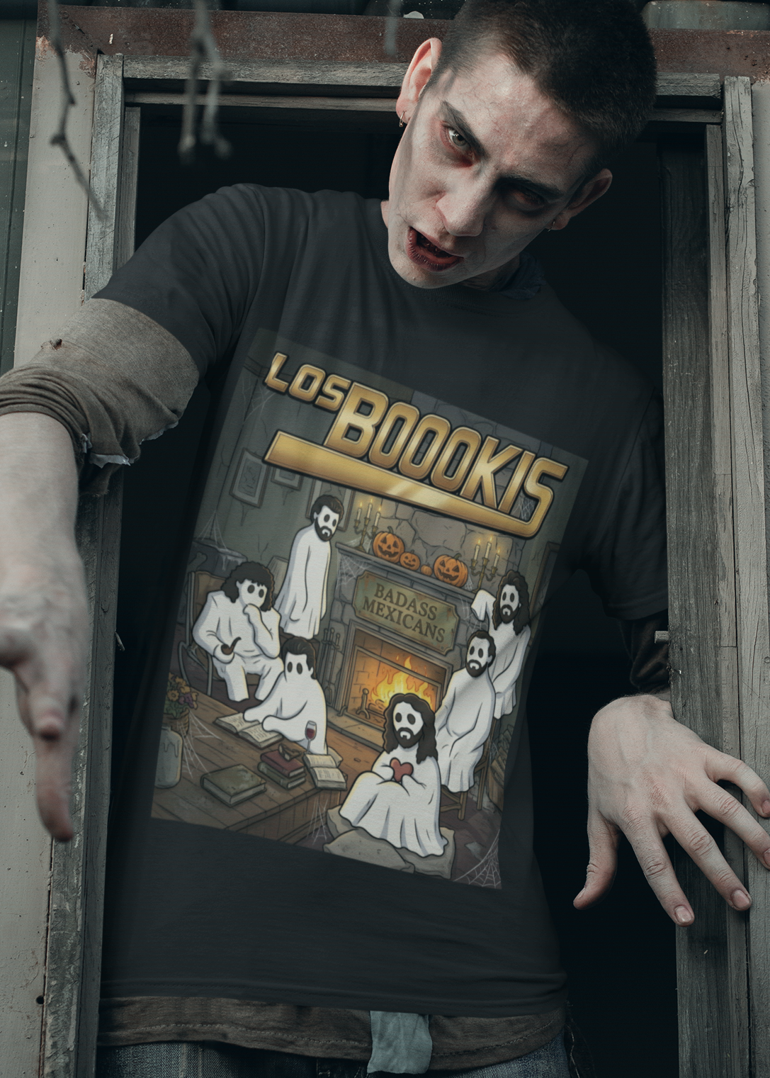 Black t-shirt featuring a spooky band parody with ghosts around a fireplace with text reading "LOS BOOOKIS".