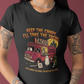 Black t-shirt featuring a spooky taco truck graphic with monsters in line under the text "Keep the candy I'll take the tacos".