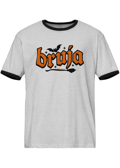 Grey ringer t-shirt with black collar and cuffs featuring the word "BRUJA" in bold orange font with a bat and broomstick graphic.