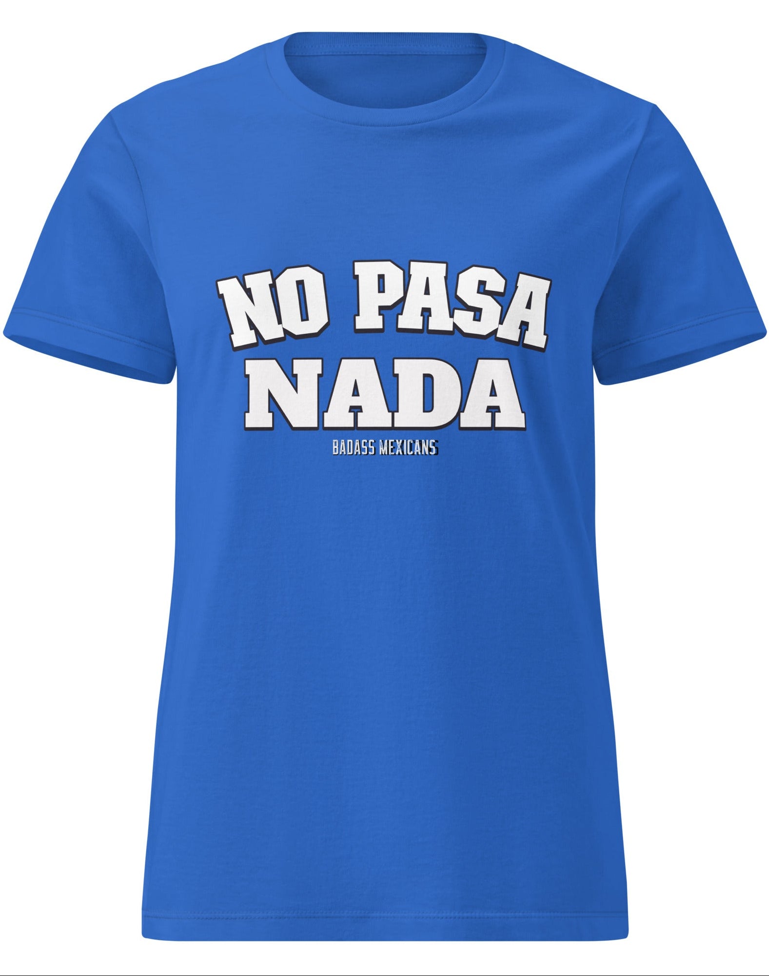 a blue t-shirt with the phrase “No Pasa Nada” printed in bold white letters, seated in an arcade environment with colorful lights in the background.