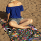 otomi inspired black beach towel with colorful birds flowers and mexican folk art style design on dark background